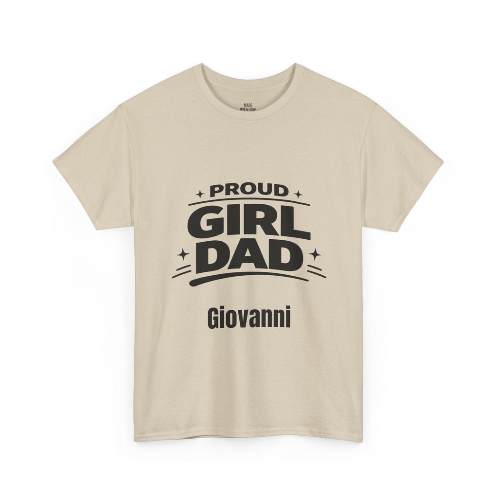 A light beige crewneck t-shirt with a black graphic print that reads 'PROUD GIRL DAD' and the name 'Giovanni' underneath, displayed on a clean white background.