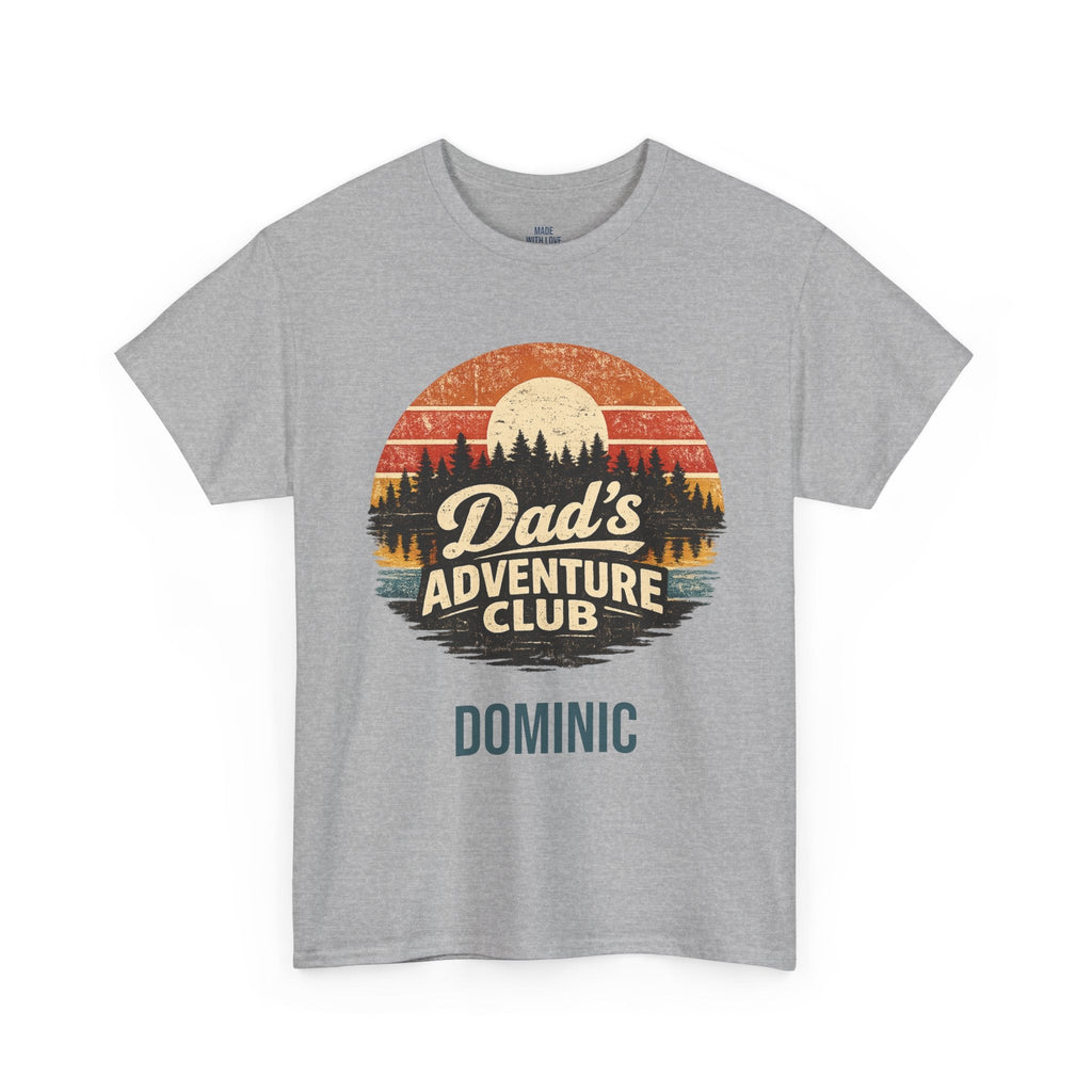 A heather gray short-sleeve t-shirt with a retro circular graphic on the chest reading 'Dad's Adventure Club' and the name 'DOMINIC' printed below, shown on a plain white background.