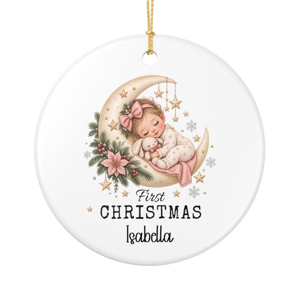 Personalized Baby Girl First Christmas Moon ornament with a sleeping baby girl on a crescent moon, pink florals and stars, front view