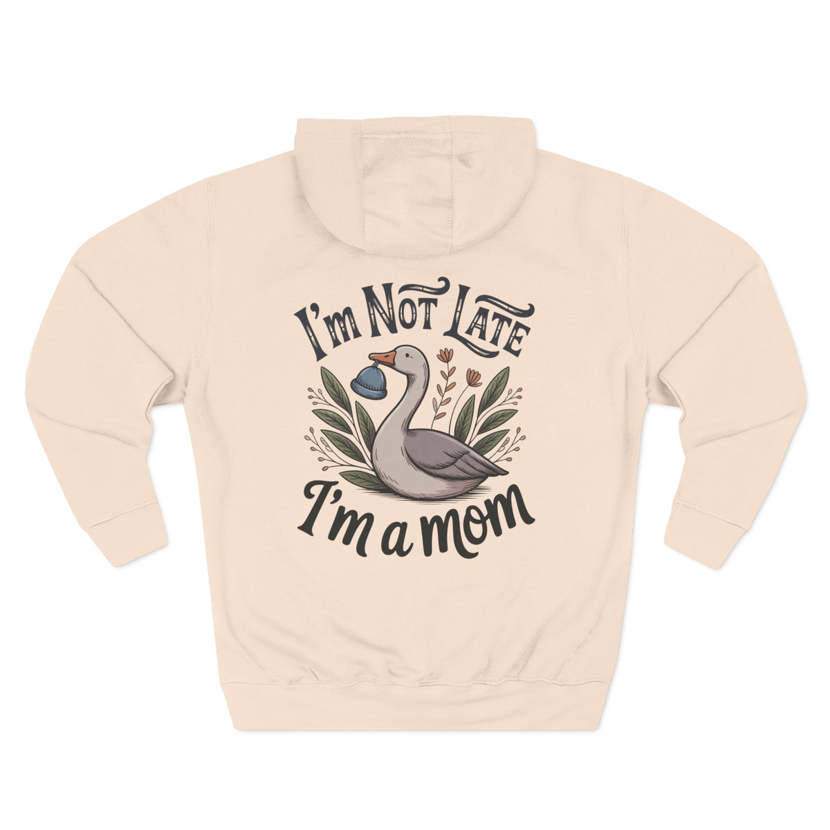 A light beige hoodie shown from the back, featuring a graphic of a goose with the text 'I'm Not LATE I'm a mom' in a stylized font.