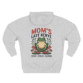A light heather gray hoodie shown from the back, for Mom, featuring a colorful graphic of a green frog sitting on crossed red stakes with the text 'MOM'S LAST NERVE' above and 'SEEDS * STRESS * BLOOMS' below.