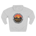 Back view of a light grey personalized hoodie printed with "Mountain Explorer – Wilderness" and embroidered with "Harrison". Special gift him, dad, granddad, boyfriend.