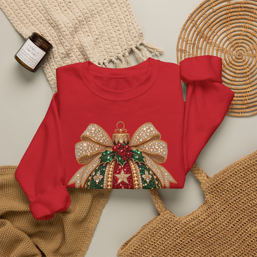Red personalized Christmas Bauble Gold Bow sweatshirt, flat lay with cozy knit blanket