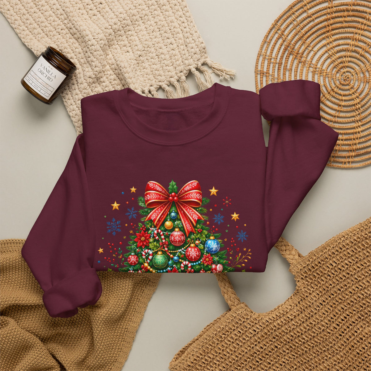 Maroon personalized Christmas Tree sweatshirt, flat lay with cozy knit blanket