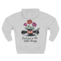 Front view of heather grey hoodie with customizable name embroidered on the chest