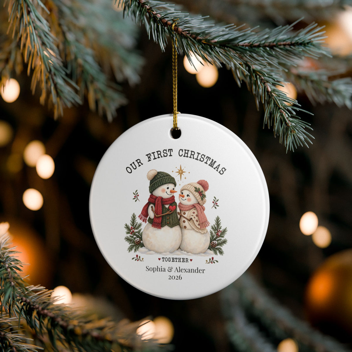 Custom first Christmas together ornament on pine branches with twinkling Christmas lights