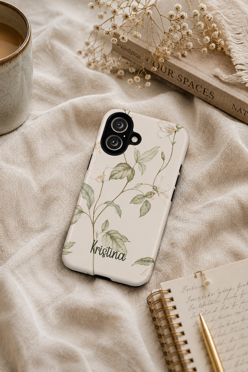 Floral bird phone case shown in a lifestyle setting
