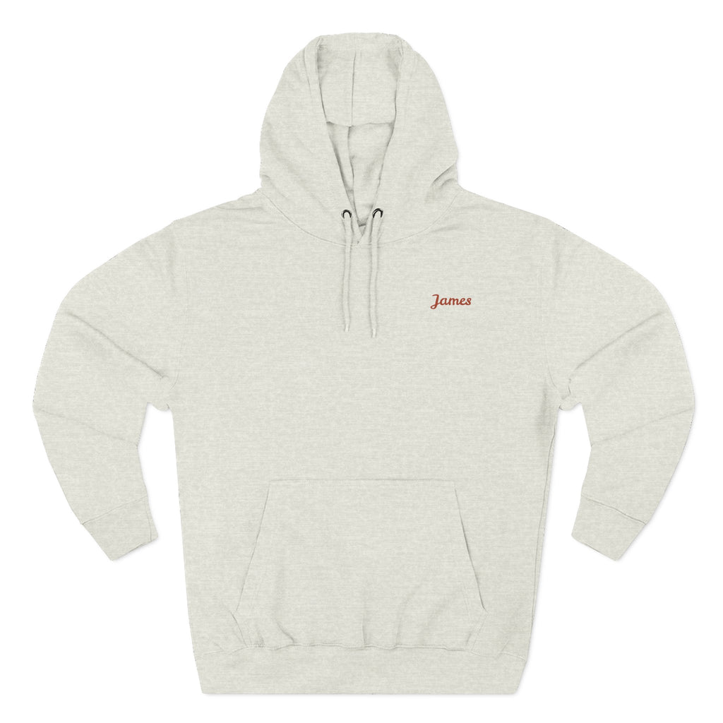 Front view of a oatmeal heather personalized hoodie printed with "Dad Fuel" and embroidered with "James". Special gift him, dad, granddad, boyfriend