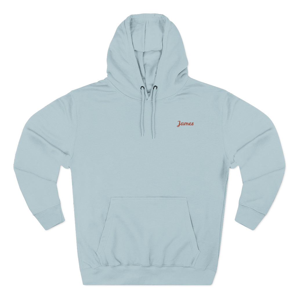 Front view of a light blue personalized hoodie printed with "Dad Fuel" and embroidered with "James". Special gift him, dad, granddad, boyfriend
