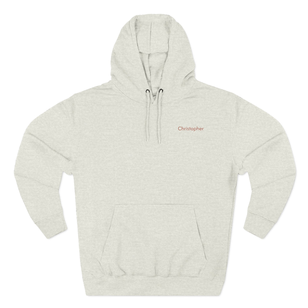 Front view of a oatmeal heather personalized hoodie printed with "Dad's Adventure Club" and embroidered with "Christopher". Name is customizable. Special gift for him.