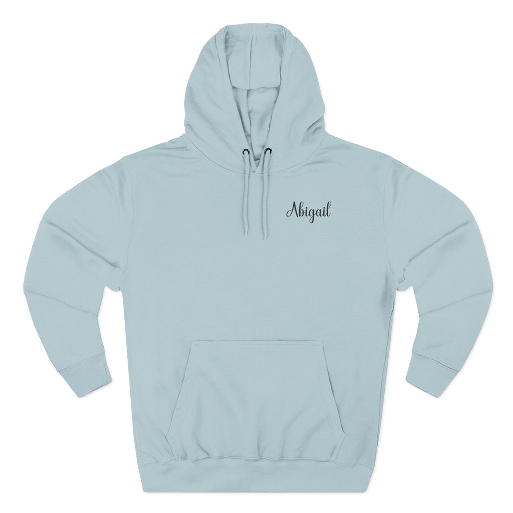 Front view of the personalized hoodie printed with "I'll Get to It Eventually" and embroidered with "Abigail" for her. Color Blue mist
