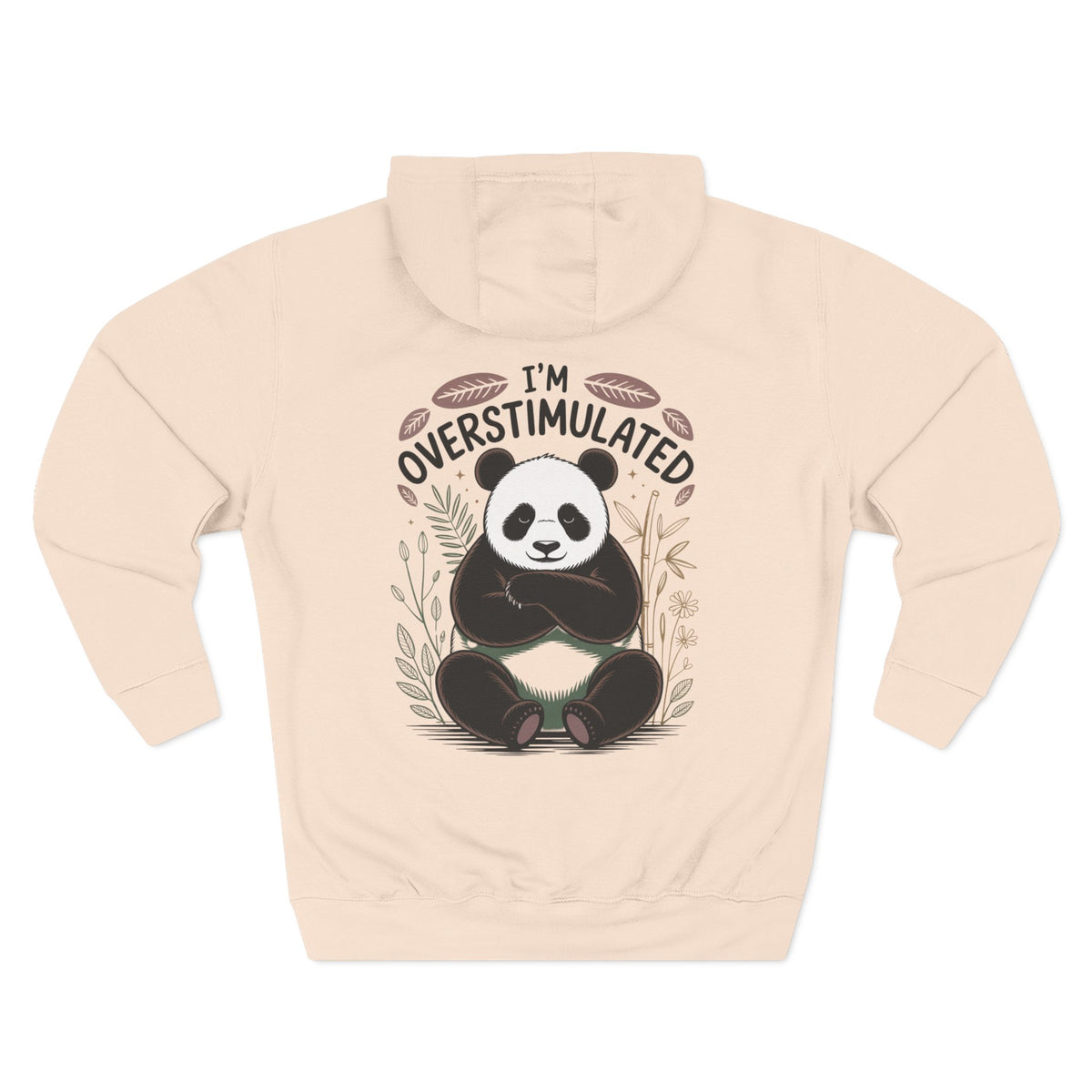 A Pale pink long-sleeve hoodie with a graphic of a panda sitting in the center, surrounded by the text 'I'M OVERSTIMULATED' and small botanical illustrations. For her or for Mom