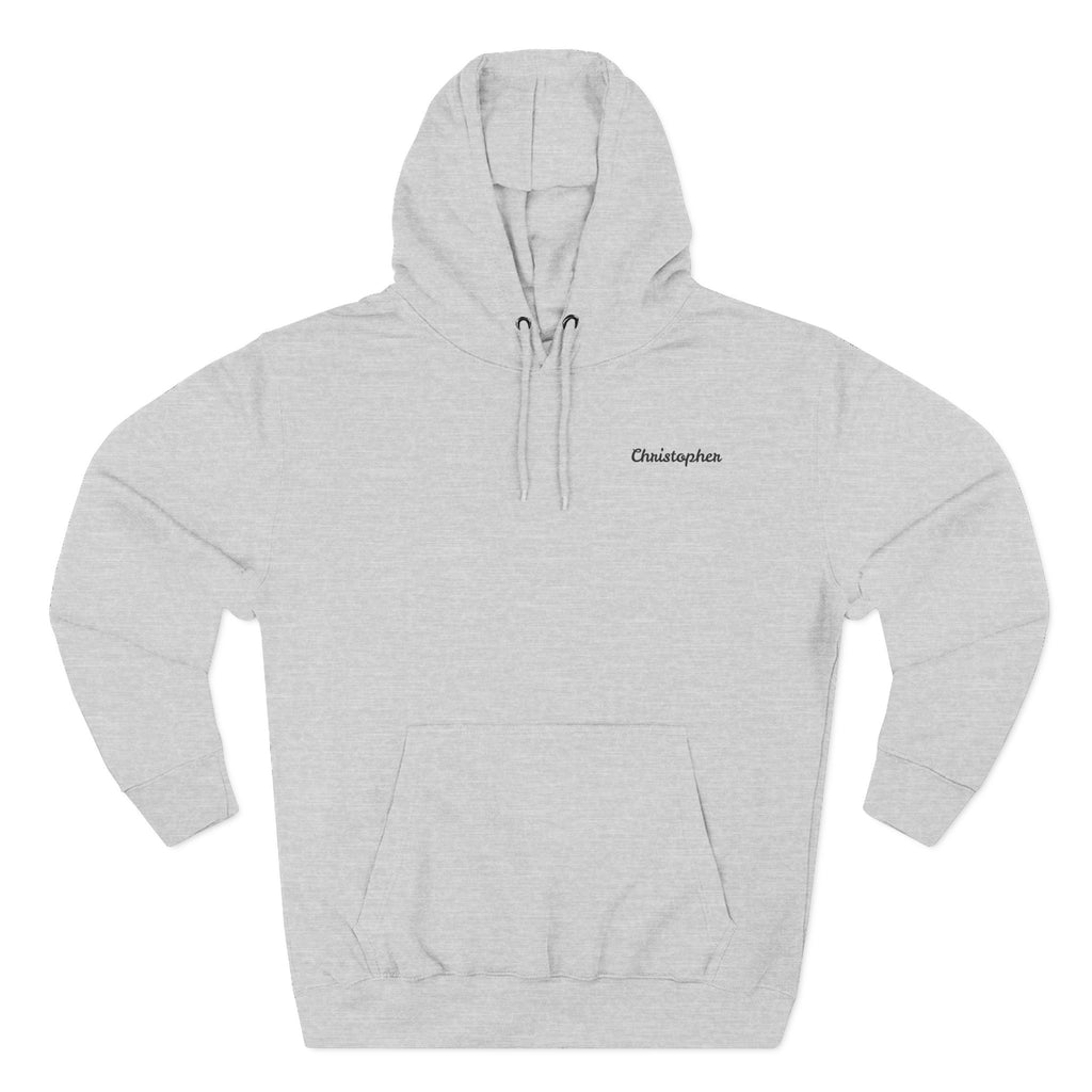 Front view of a light grey personalized hoodie printed with "Mountain Explorer – Superior Denim, Since 1982" and embroidered with "Christopher". Name is customizable. Special gift for him.