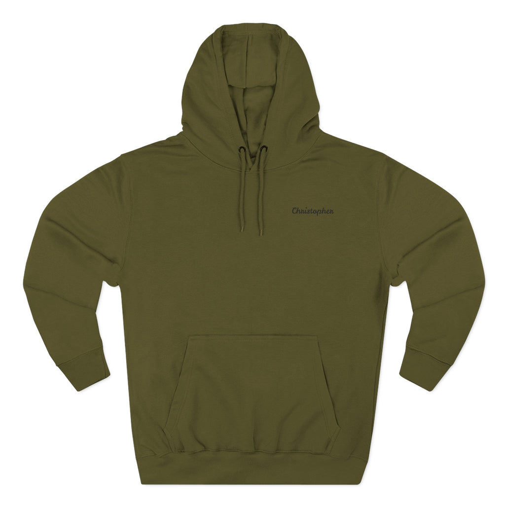 Front view of a green personalized hoodie printed with "Mountain Explorer – Superior Denim, Since 1982" and embroidered with "Christopher". Name is customizable. Special gift for him.