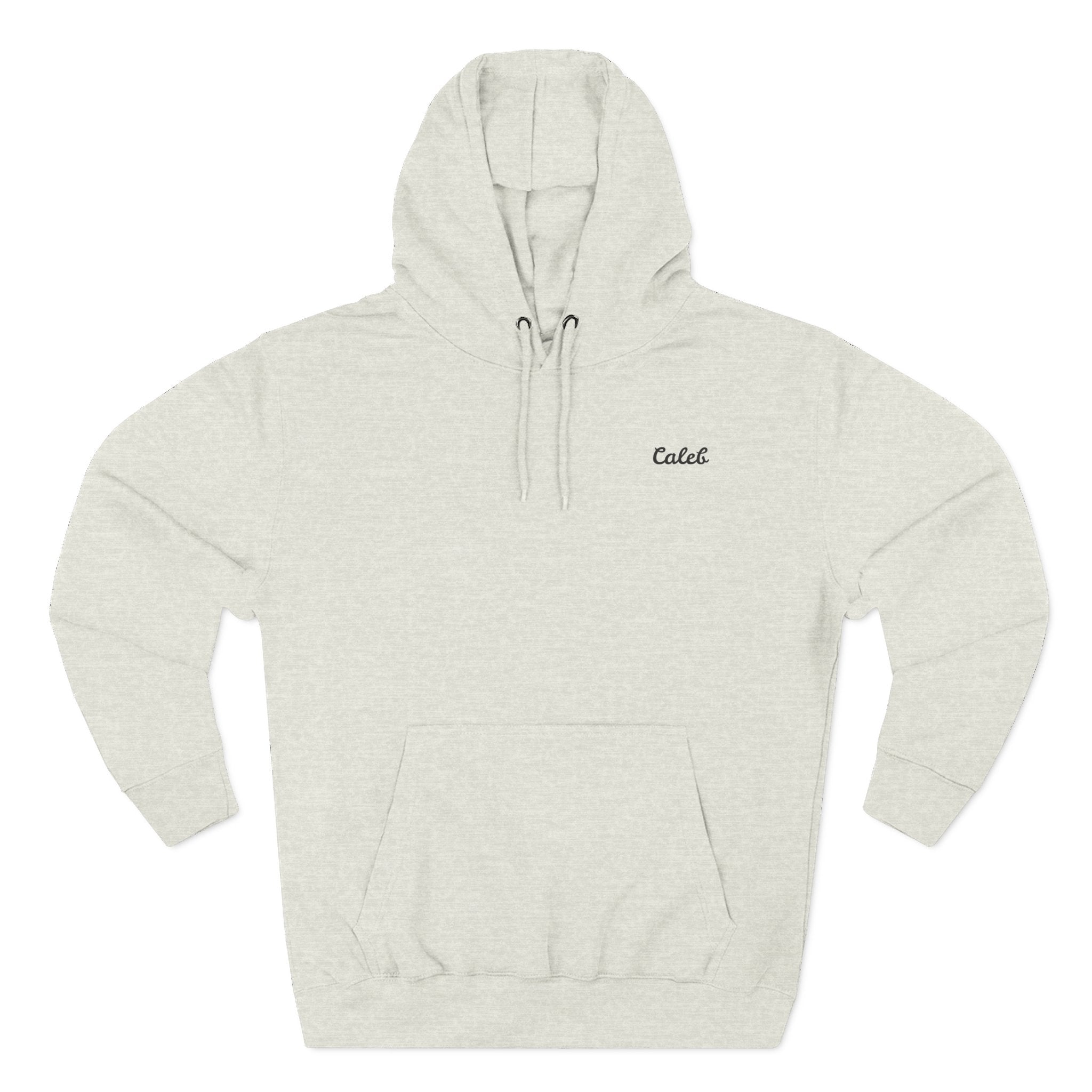 Front view of a oatmeal heather personalized hoodie printed with "My First Hero, My Dad" and embroidered with "Caleb".Name is customizable. Special gift for him.