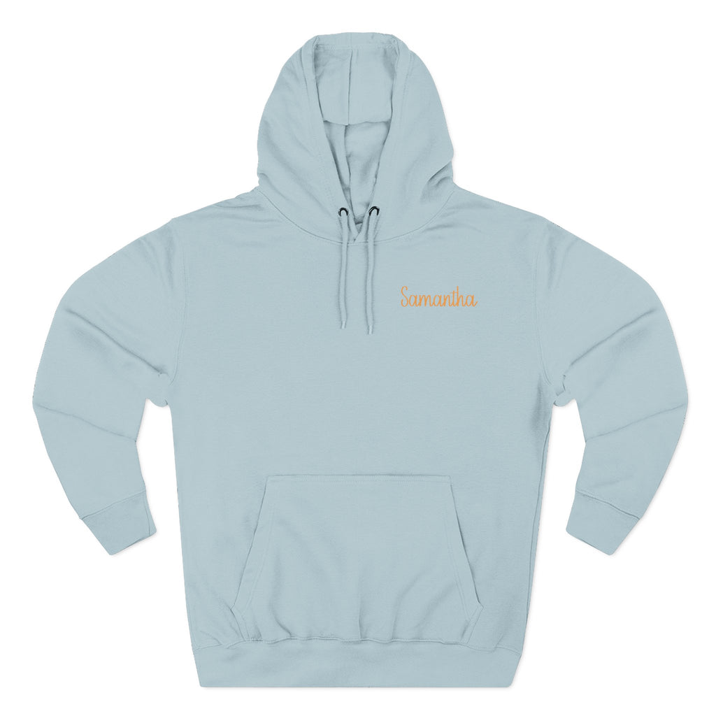 Front view of blue mist hoodie with customizable name embroidered on the chest