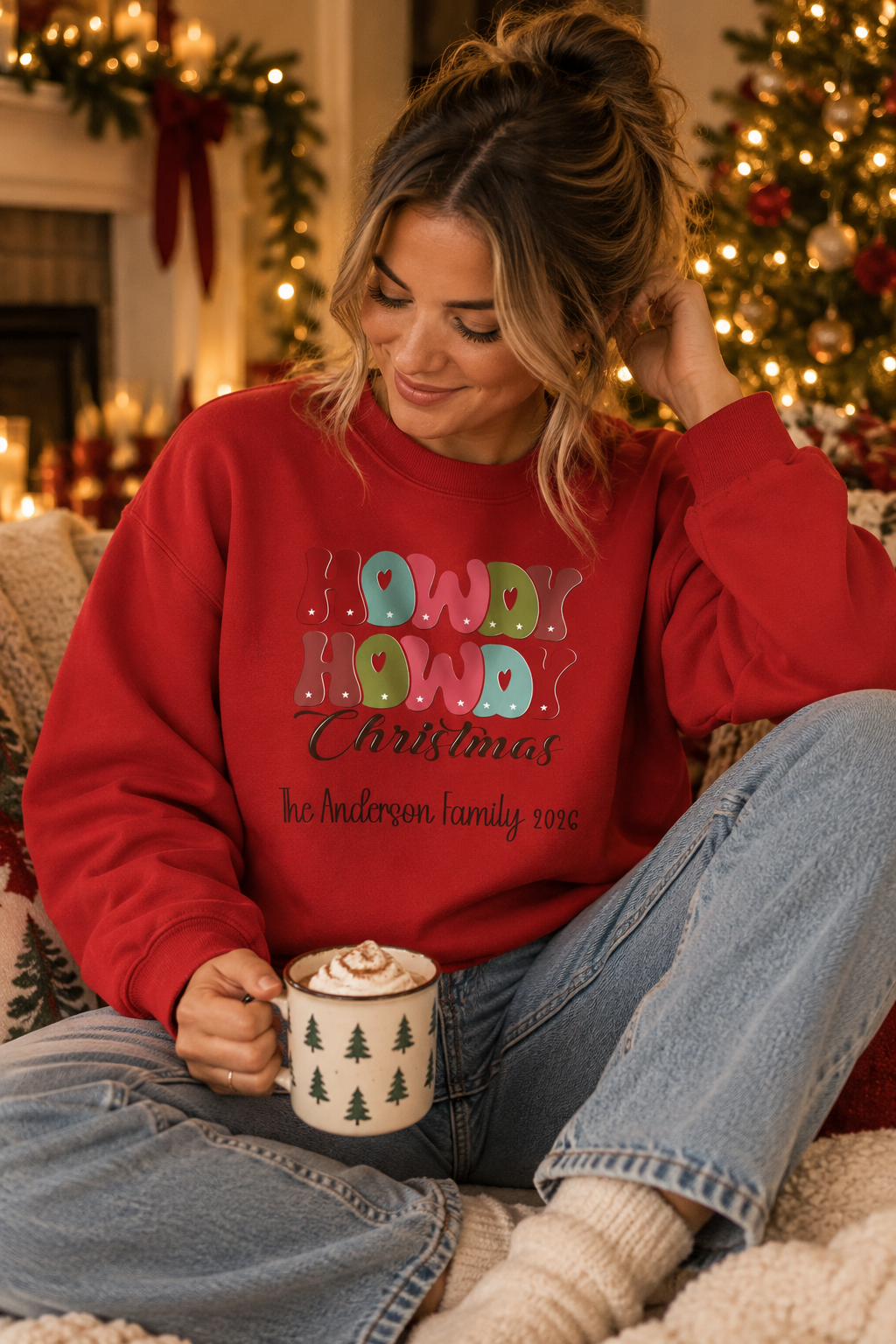 Red personalized Howdy Howdy Christmas sweatshirt, lifestyle photo by the Christmas tree