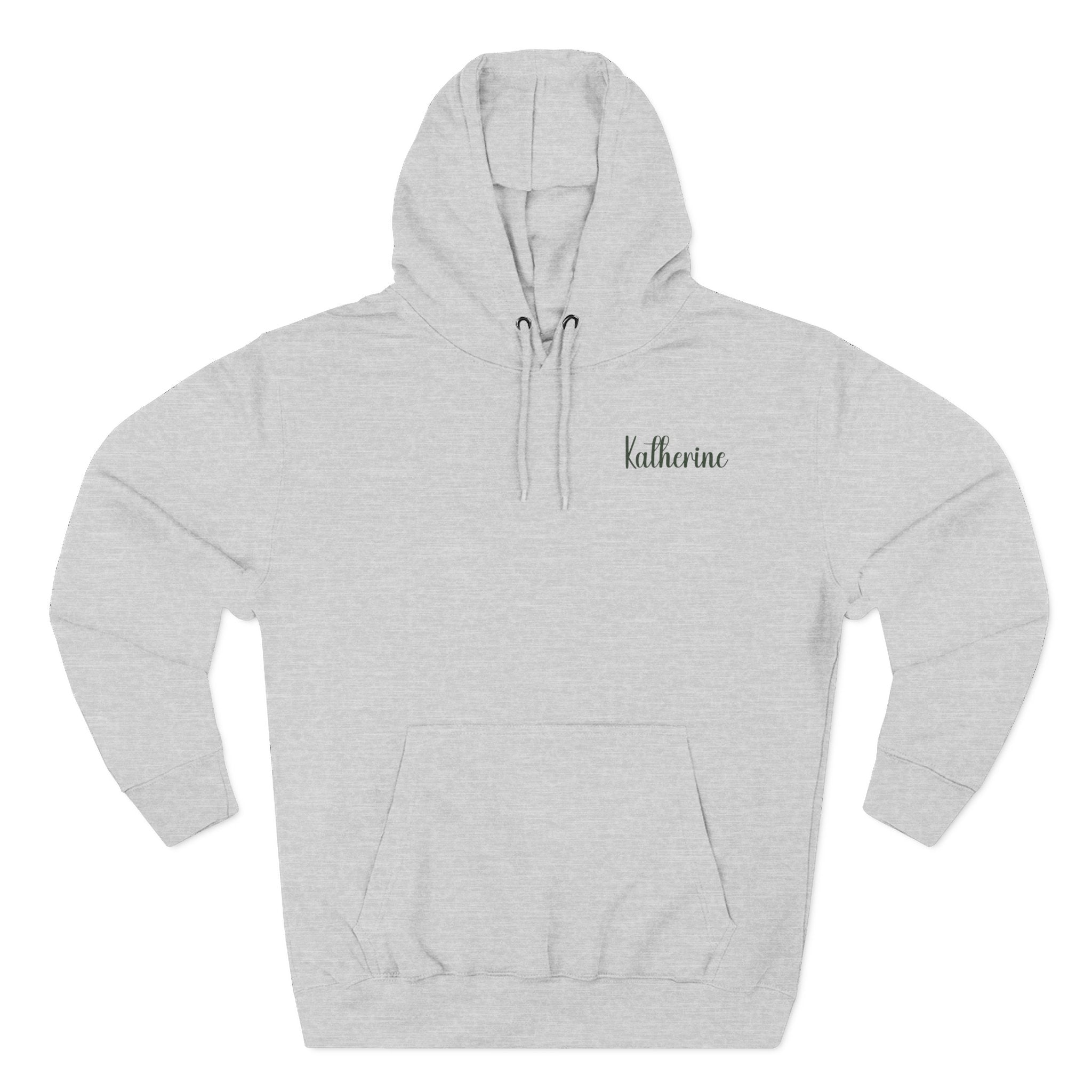 Front view of heather grey hoodie with customizable name embroidered on the chest