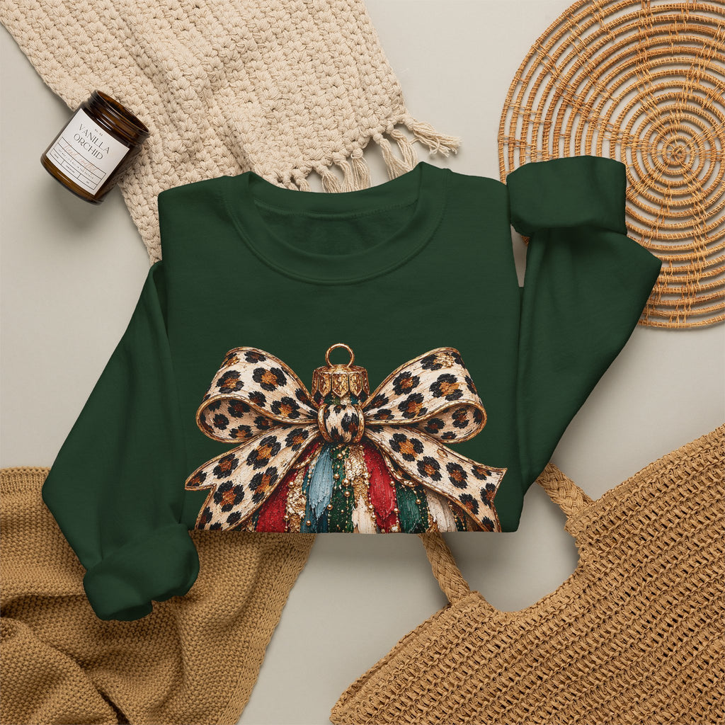 Forest Green personalized Leopard Bow Bauble sweatshirt, flat lay with cozy knit blanket