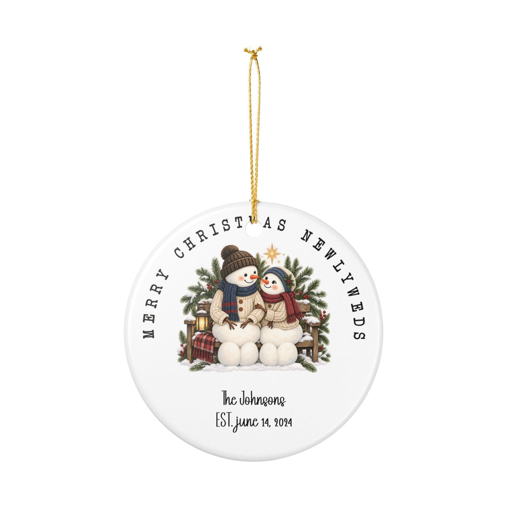 Personalized Merry Christmas Newlyweds ornament hanging from its gold string