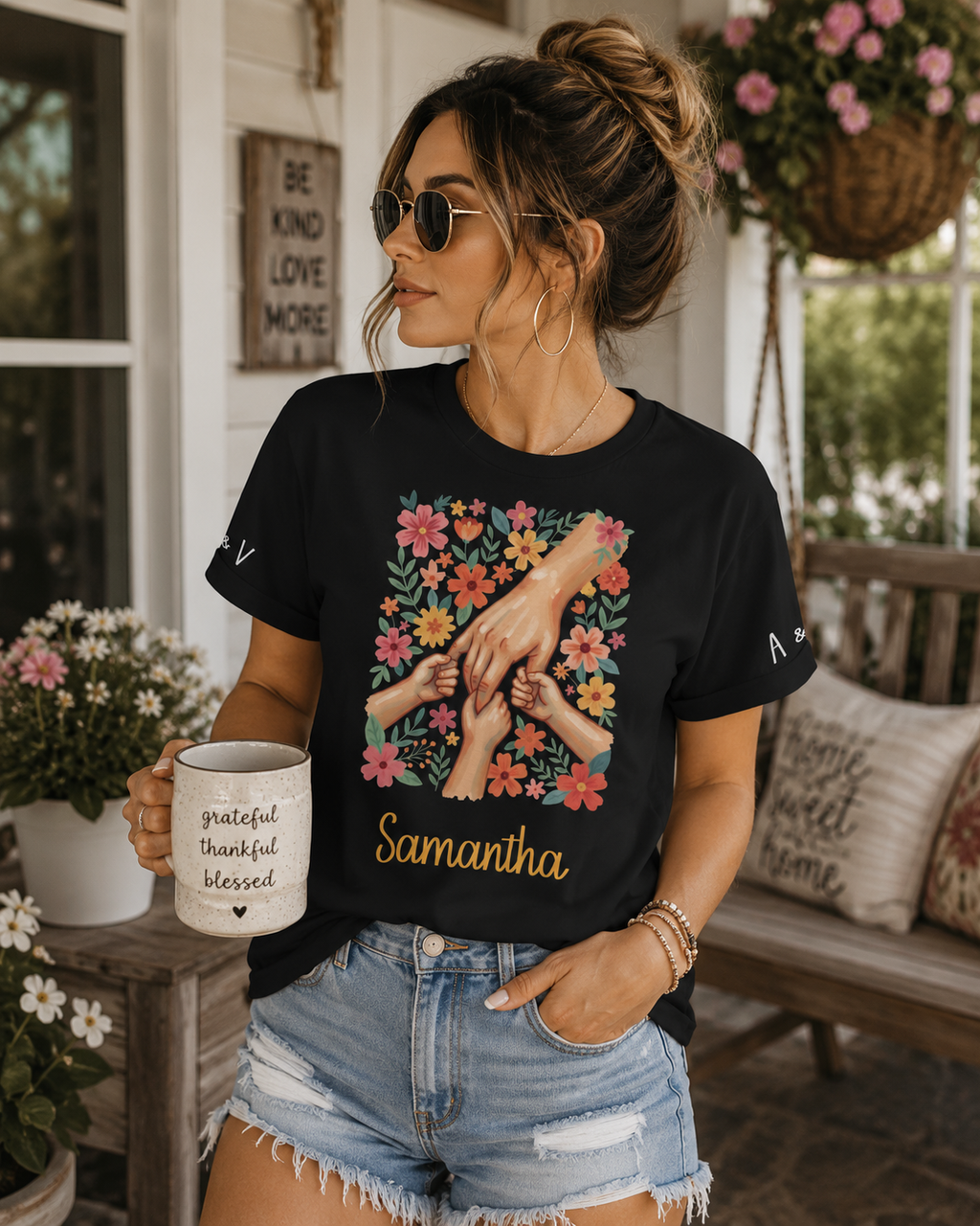 Family Hands Floral t-shirt shown in a lifestyle setting