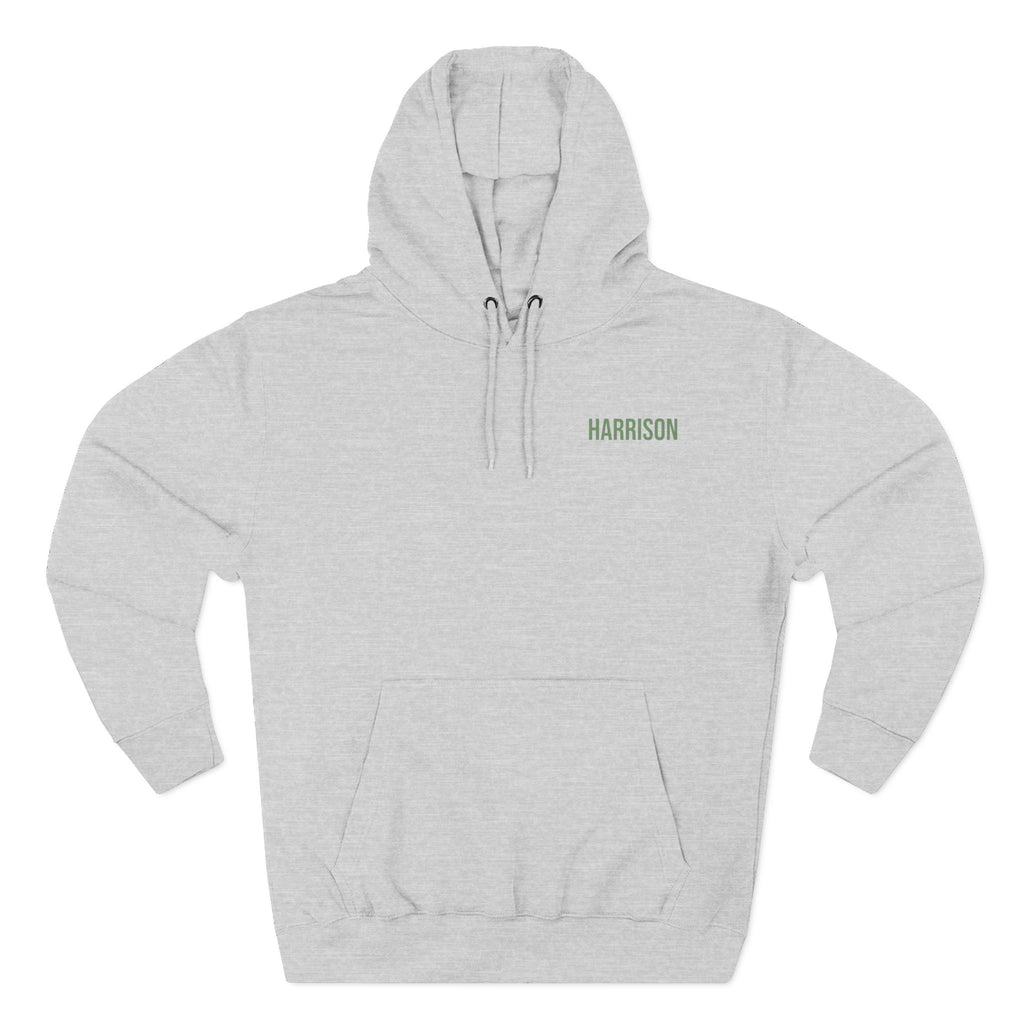 Back view of heather grey hoodie with mountain landscape badge design