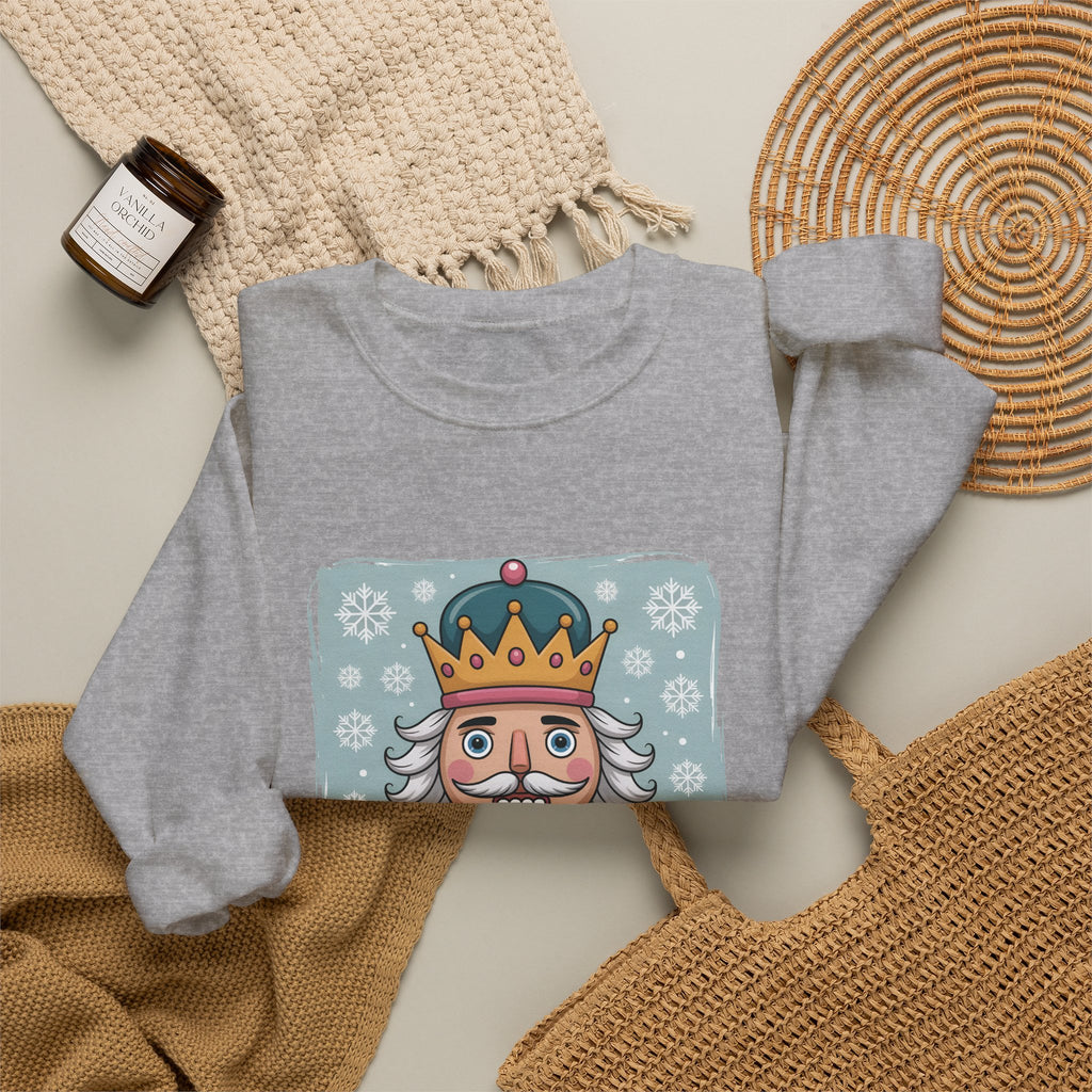 Sport Grey personalized Nutcracker sweatshirt, flat lay with cozy knit blanket