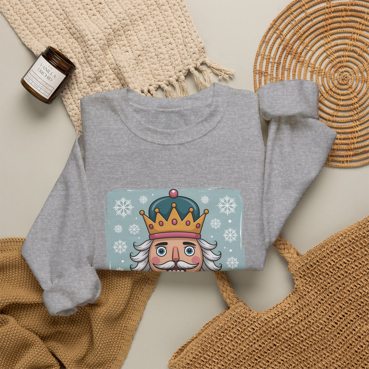 Sport Grey personalized Nutcracker sweatshirt, flat lay with cozy knit blanket