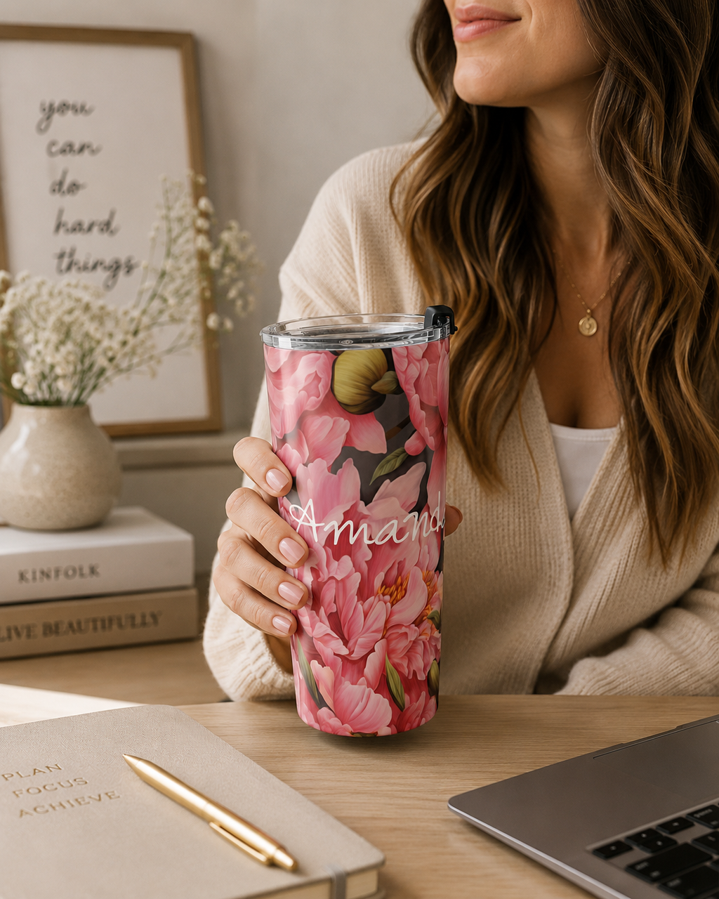 Pink peony tumbler styled in an elegant lifestyle scene