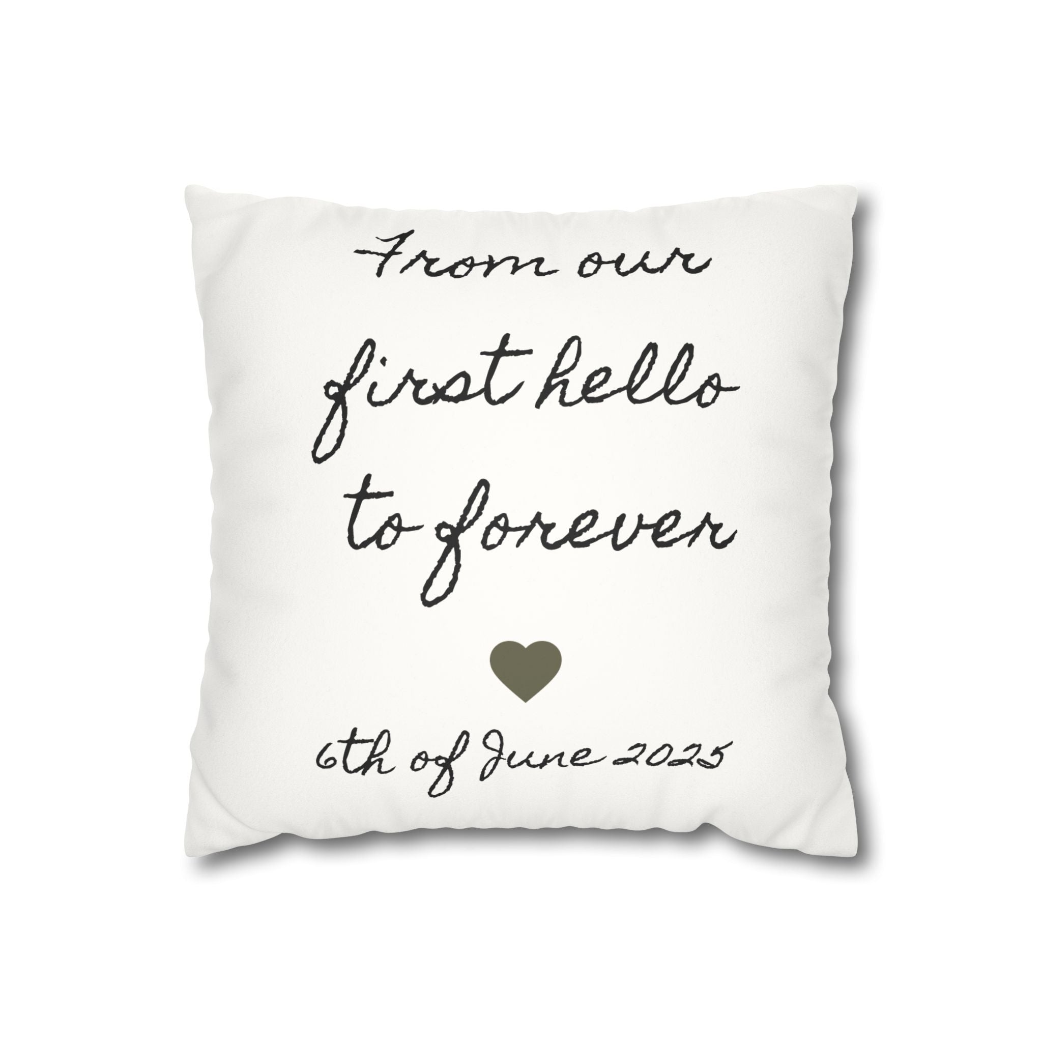 Personalized faux suede throw pillow printed with the hand-lettered phrase From our first hello to forever above a heart and a custom anniversary date