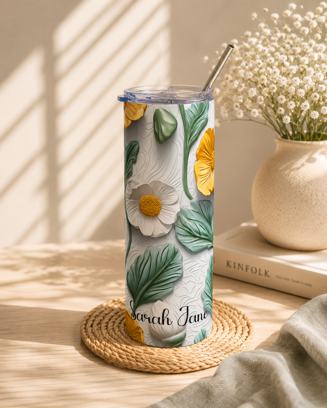 Botanical floral tumbler held in hand in an everyday lifestyle scene