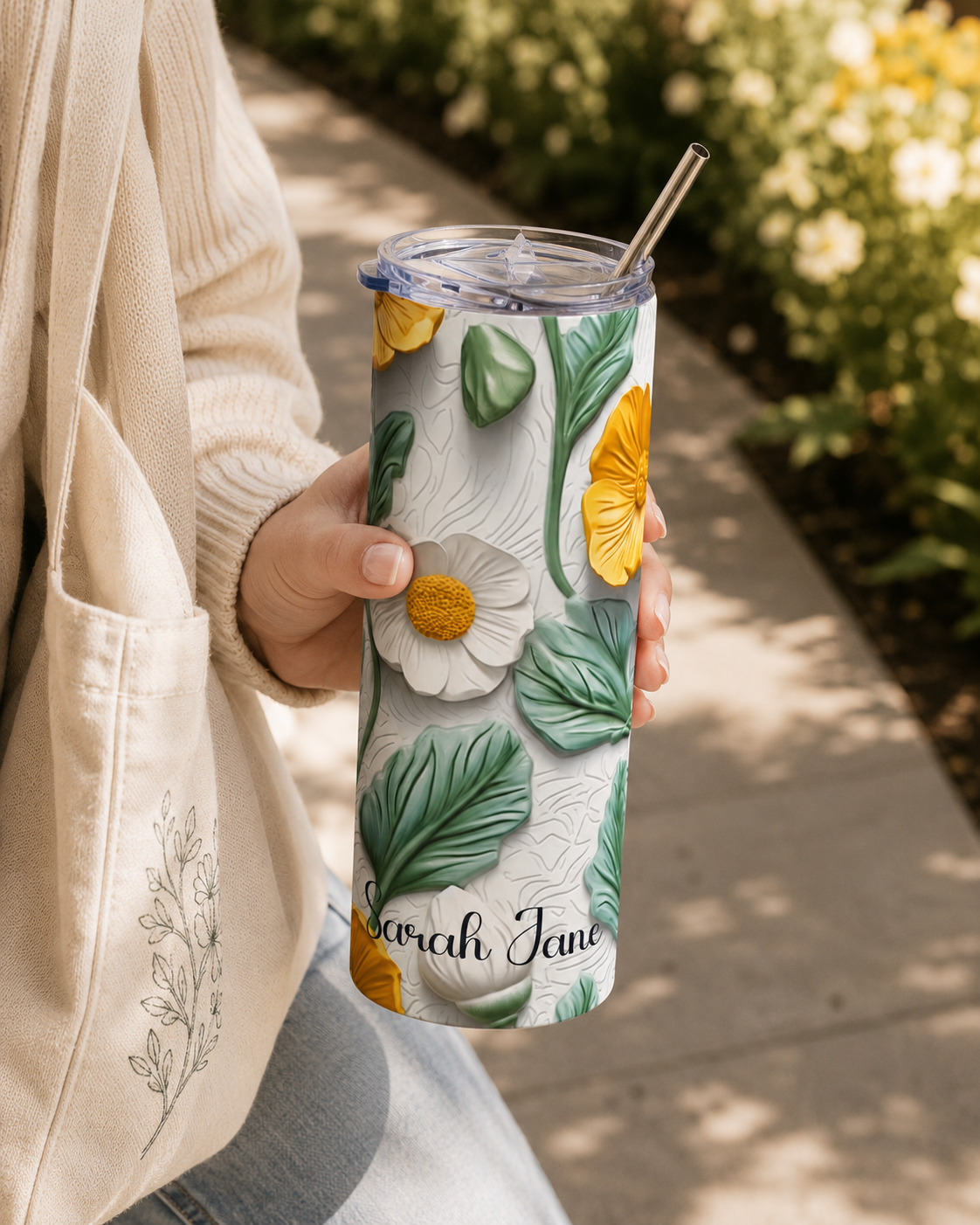 Botanical floral skinny tumbler styled with fresh greenery in a lifestyle scene