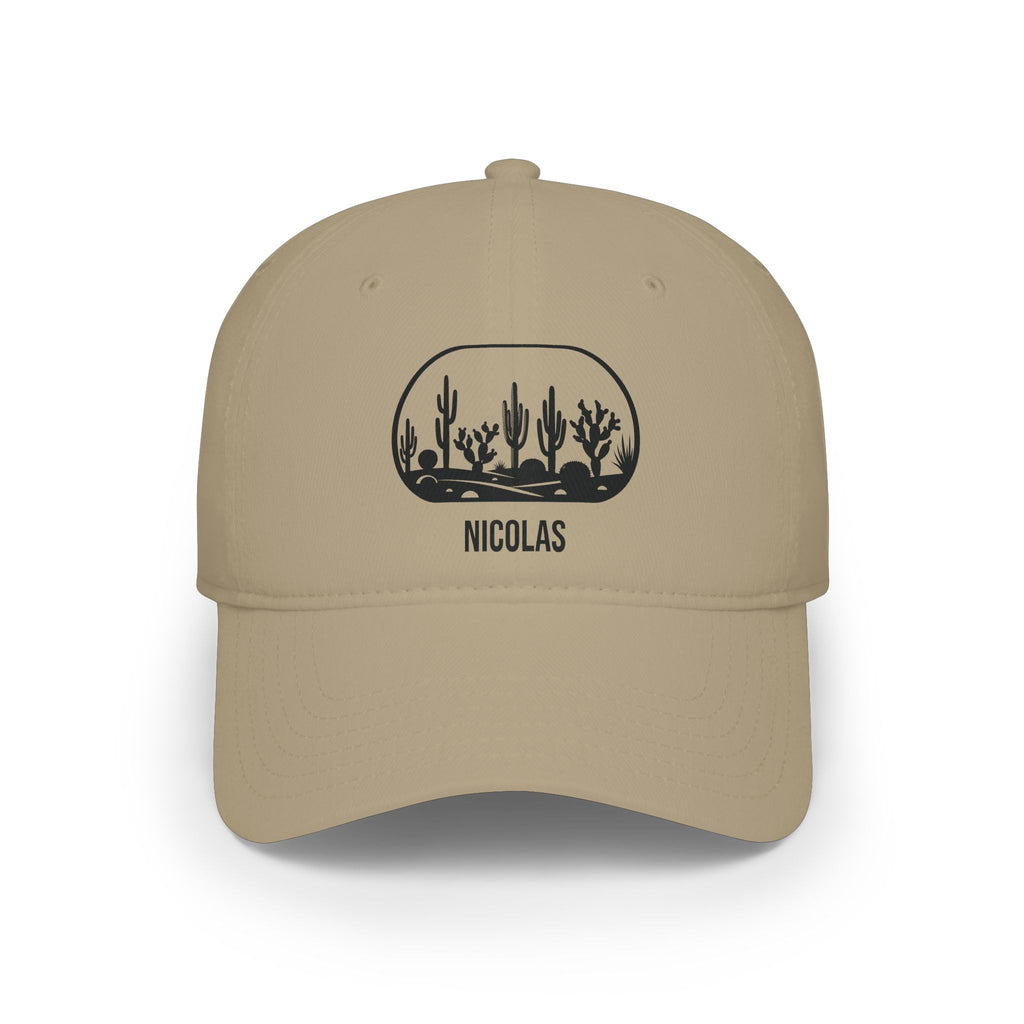 Khaki personalized cactus silhouette cap with silhouette of a row of desert cacti and boulders in a rounded frame and the name Nicolas, front view