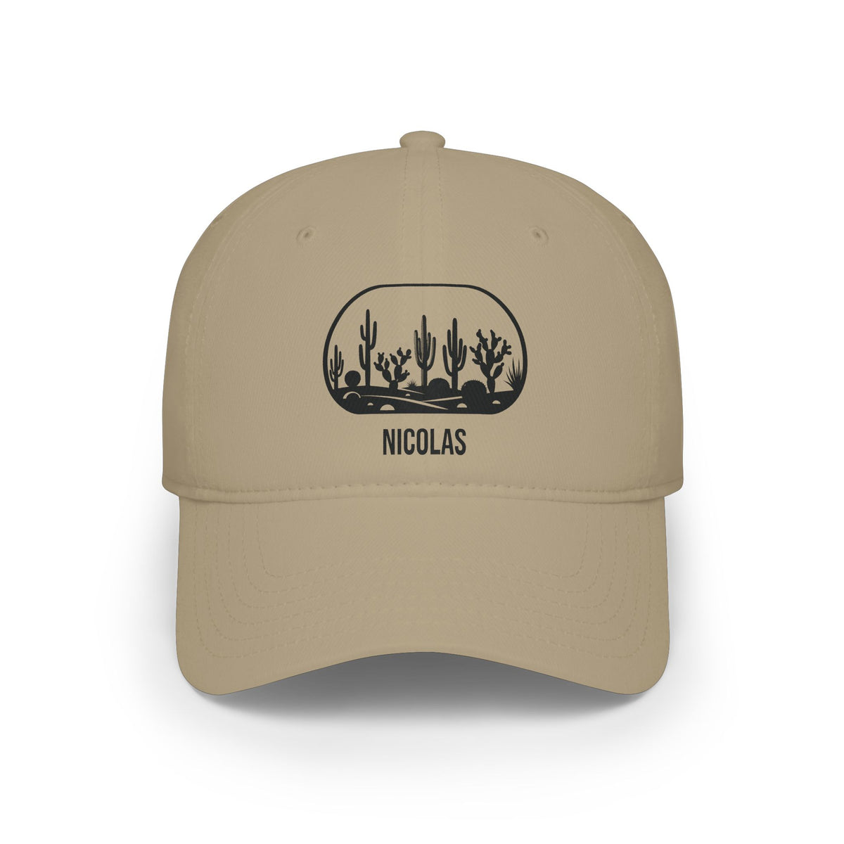Khaki personalized cactus silhouette cap with silhouette of a row of desert cacti and boulders in a rounded frame and the name Nicolas, front view