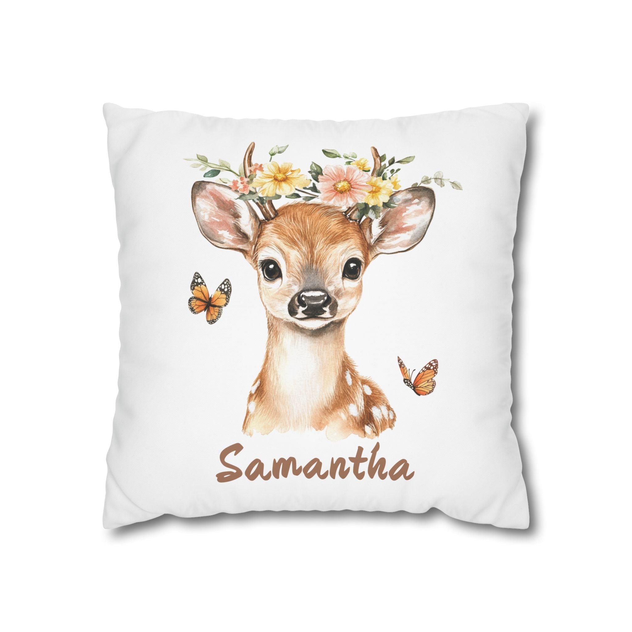 Personalized baby deer nursery pillow resting on a child's bed