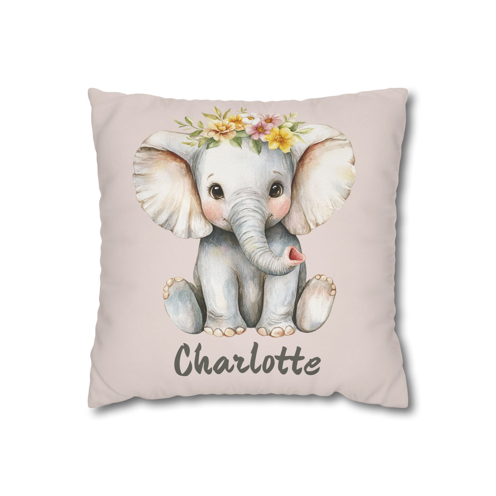 Personalized nursery pillow with a watercolour baby elephant in a floral crown on a blush background and a custom child's name