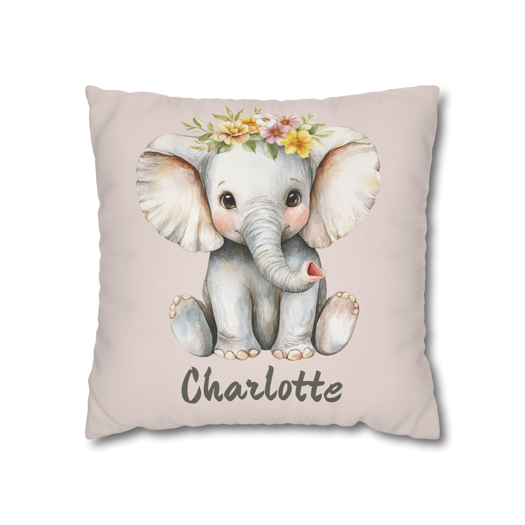 Personalized baby elephant nursery pillow resting on a child's bed