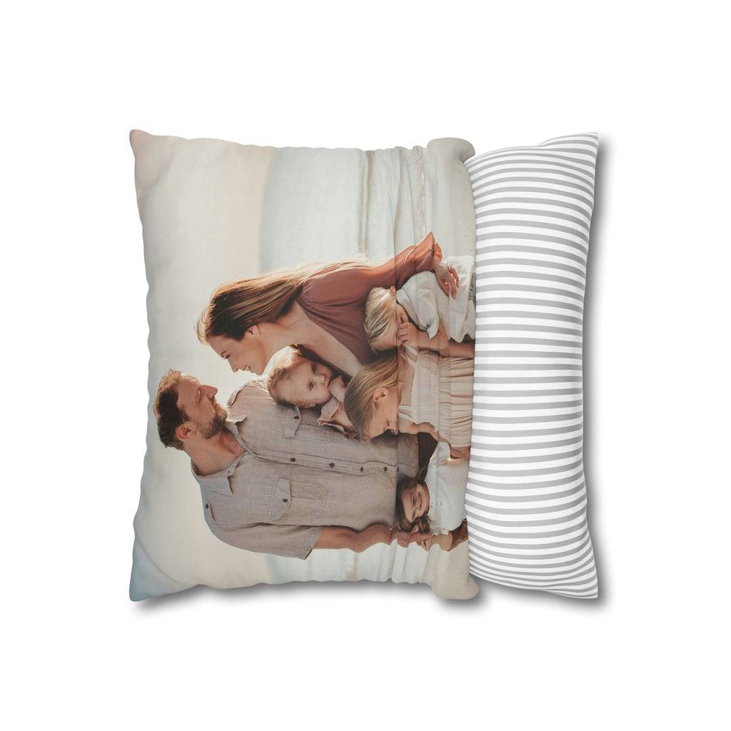 Custom family photo pillow resting on a bed