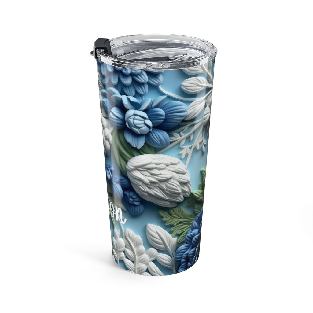 Personalized floral tumbler held in hand to show the custom name placement