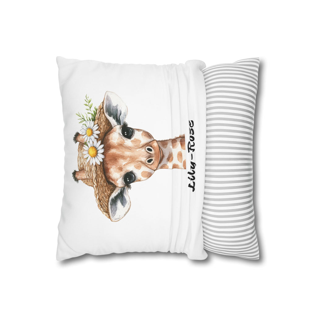 Baby giraffe name pillow styled on a nursery chair