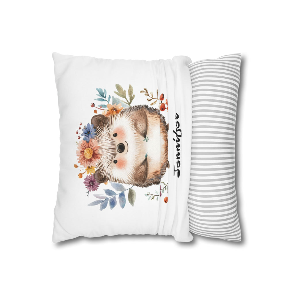 Baby hedgehog name pillow styled on a nursery chair
