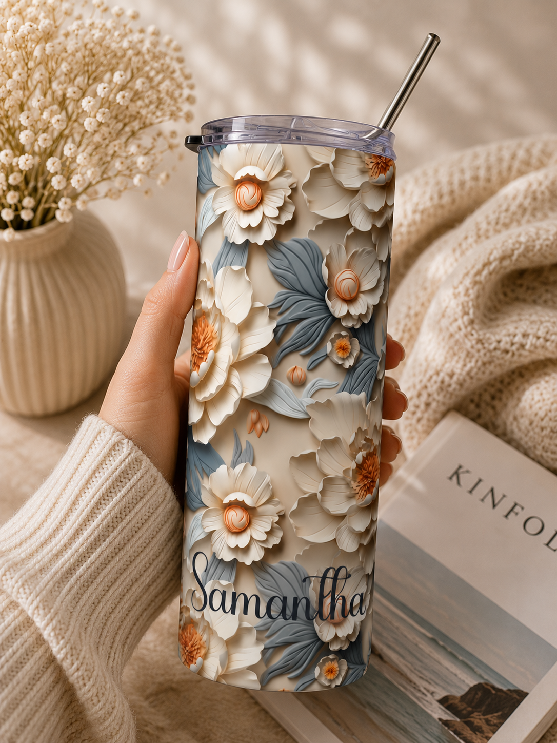 Ivory floral skinny tumbler styled with neutral decor props in a lifestyle scene