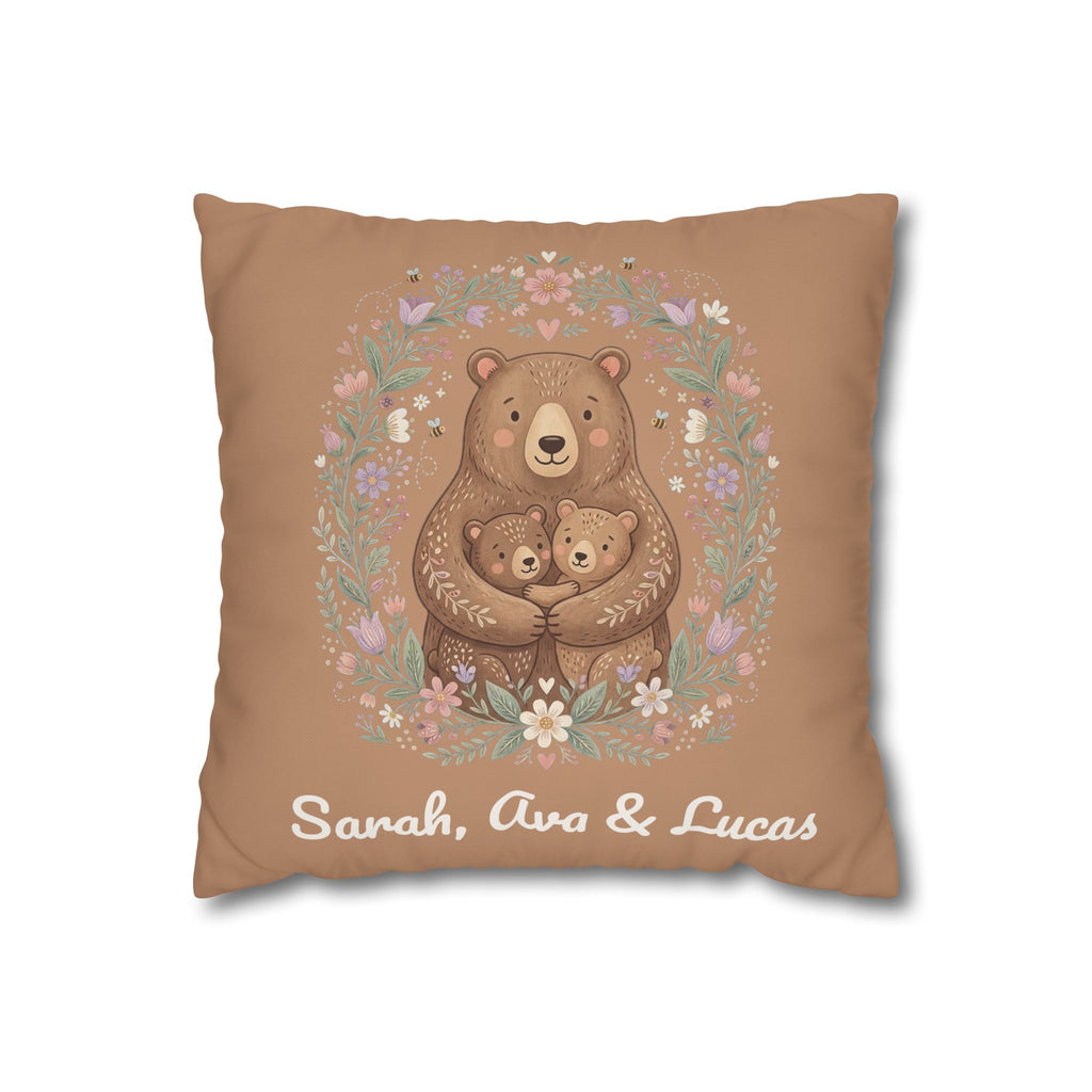 Personalized mama bear pillow with an illustrated bear hugging two cubs in a floral wreath and three custom children's names