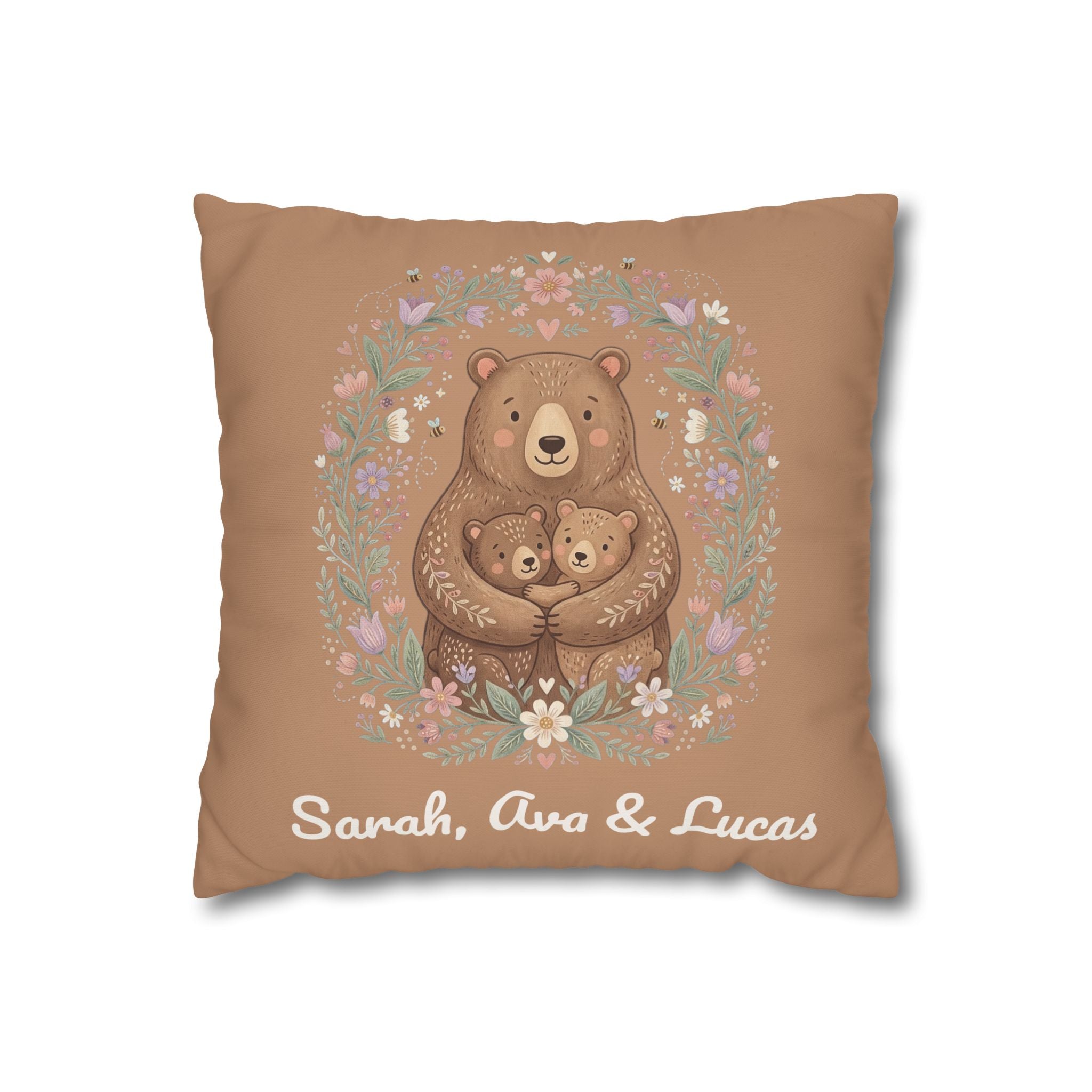 Personalized mama bear pillow with an illustrated bear hugging two cubs in a floral wreath and three custom children's names
