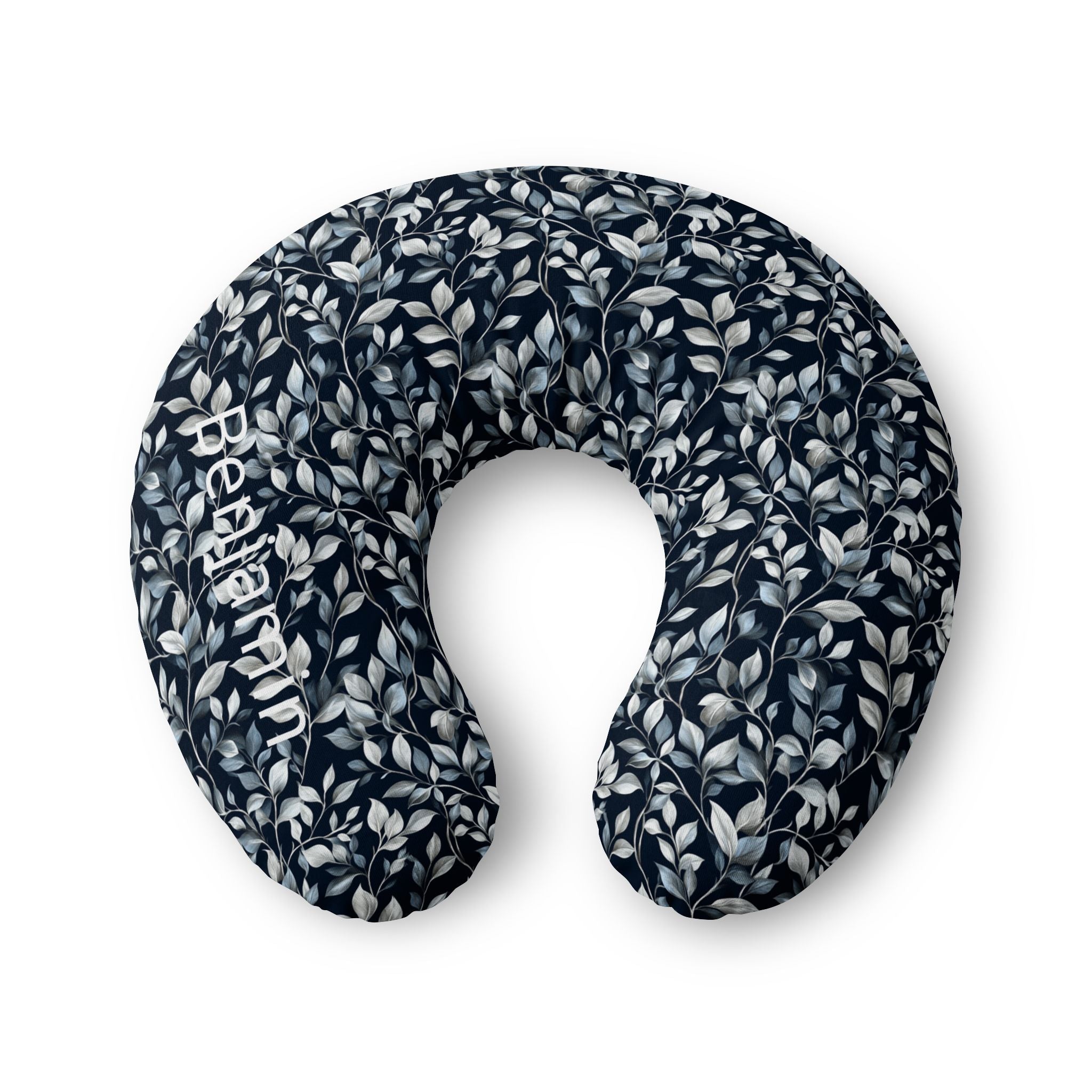 Personalized nursing pillow cover in navy with silver-blue botanical leaves and a custom baby name