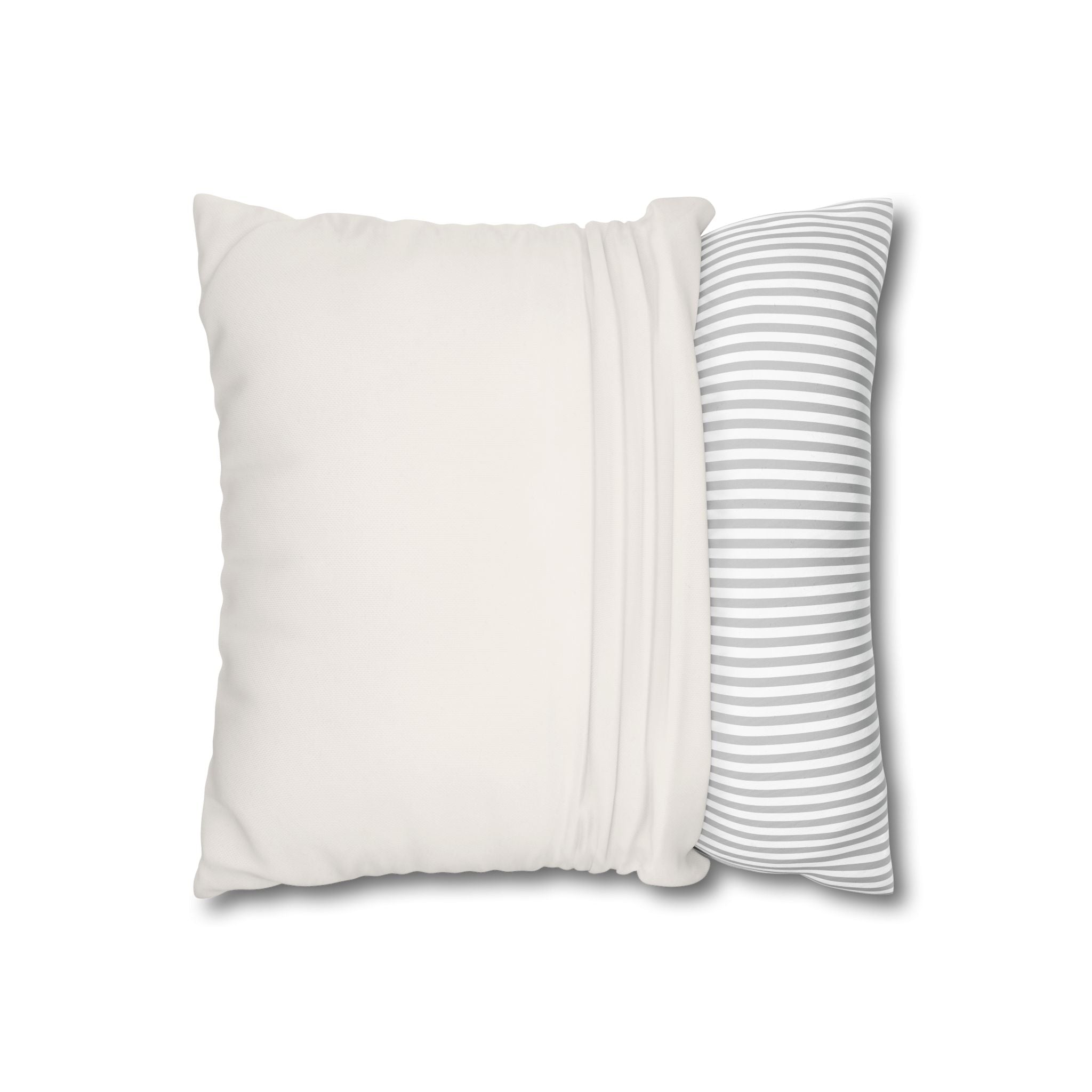 Baby panda nursery pillow resting on a sofa