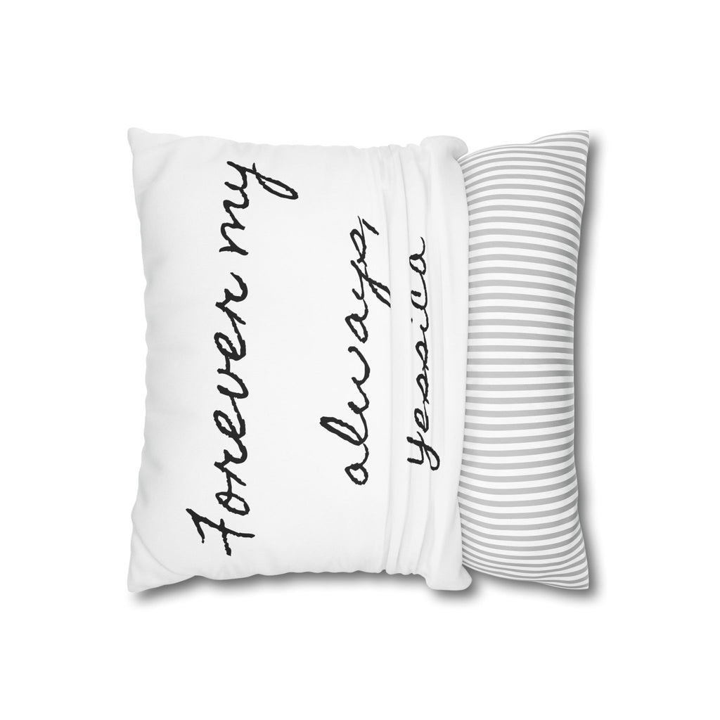 Custom love-quote pillow resting on a bed