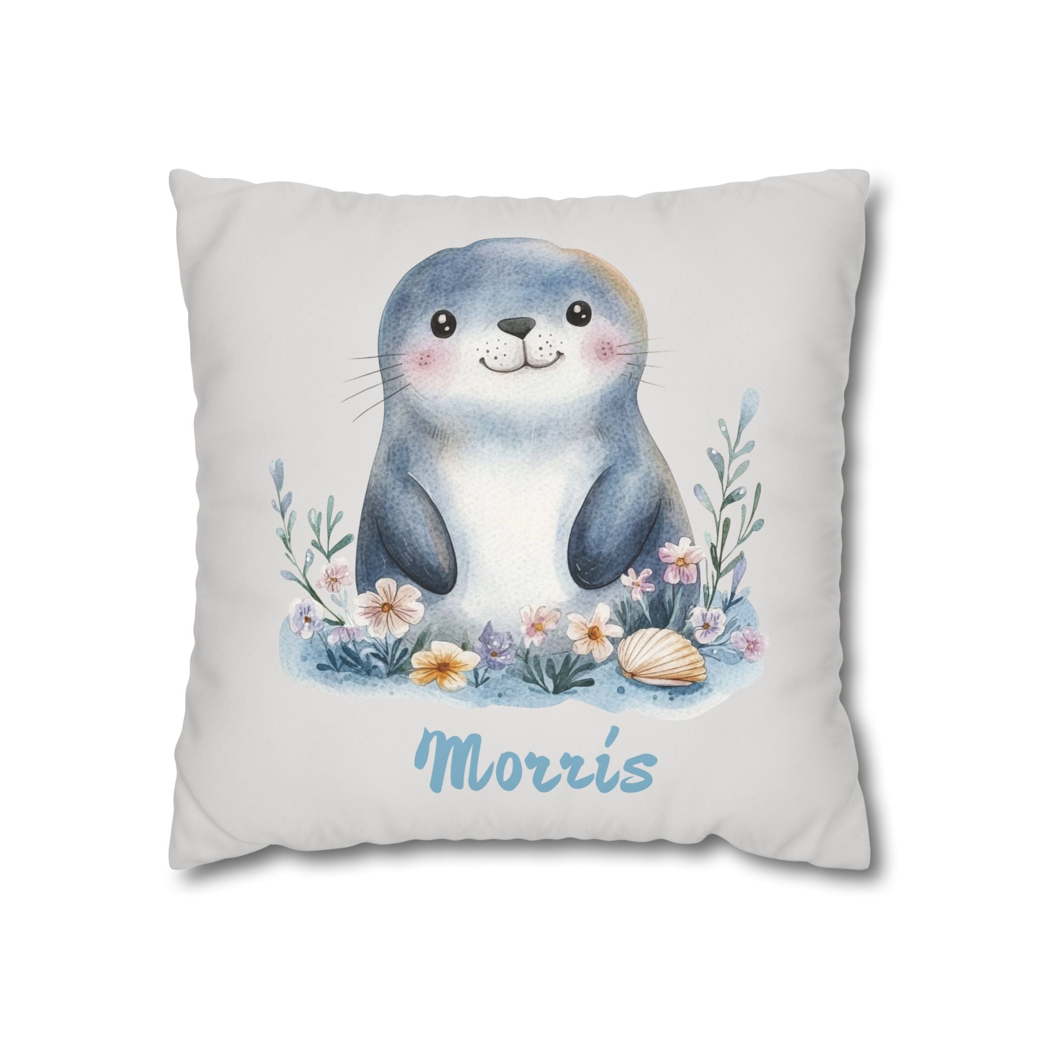 Personalized baby seal nursery pillow resting on a child's bed