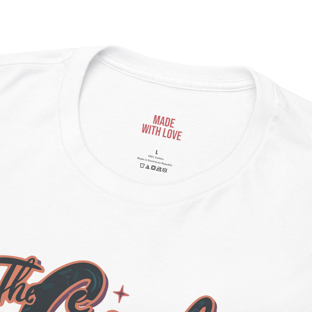Close-up of a white crewneck t-shirt showing the inner neck label with red text reading 'MADE WITH LOVE' and part of a graphic print at the bottom.