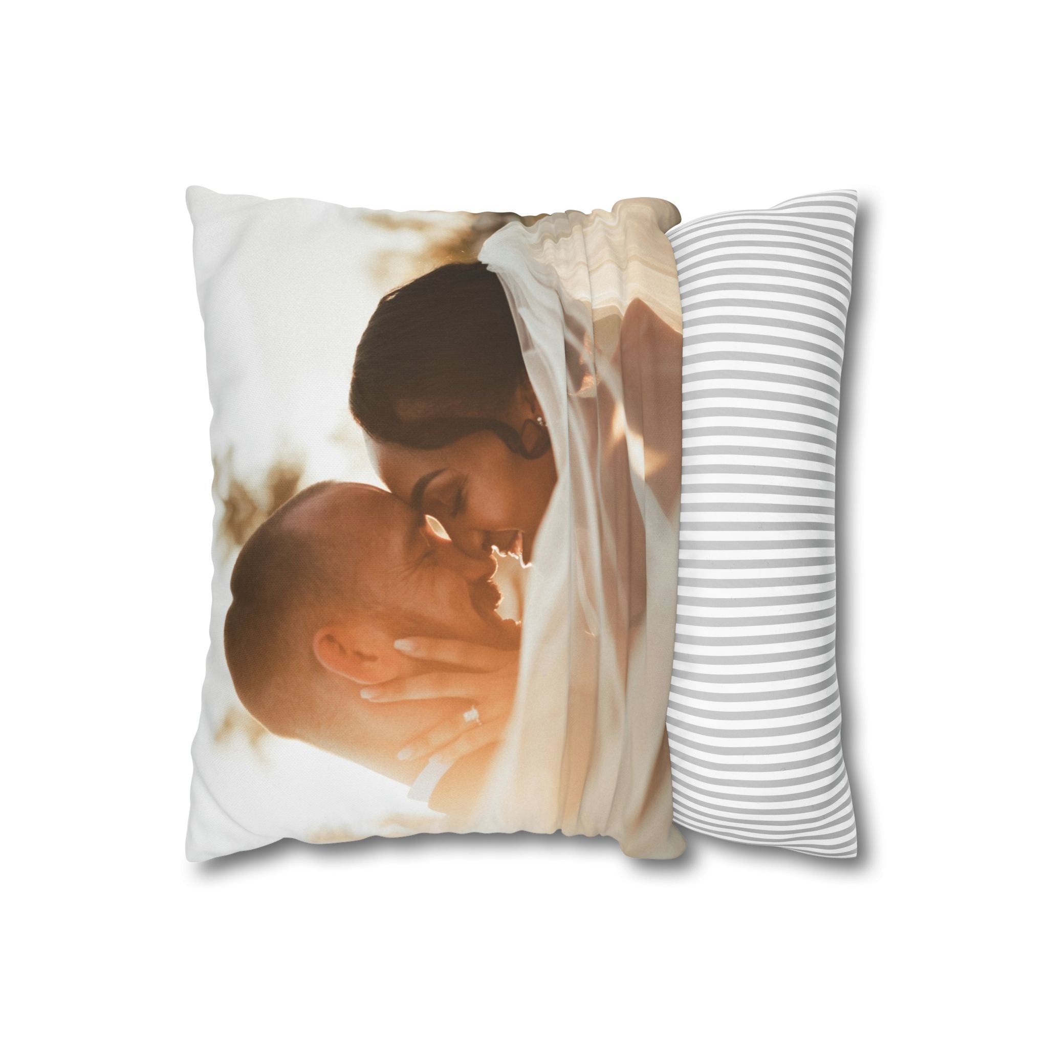 Custom wedding photo pillow resting on a bed